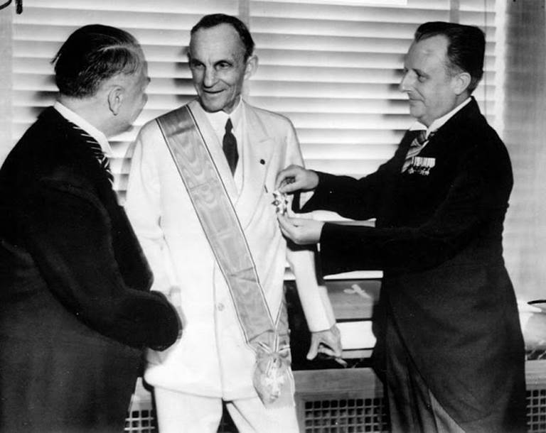 Henry Ford is presented with the Grand Cross of the Supreme Order of the German Eagle.